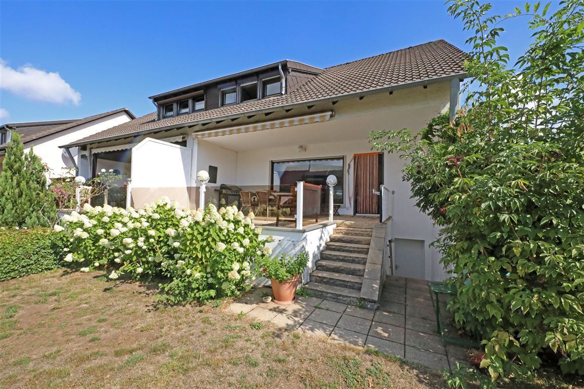 Immobilien-Richter: Sonnige Doppelhaushälfte in ruhiger und familienfreundlicher Lage. 55 Haus mit Terrassew